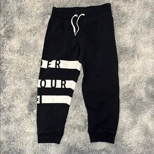 Under Armour Black Capris with Drawstring and Bold Design